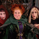 The Sanderson sisters of Hocus Pocus displaying a noticeable lack of masks or social distancing.